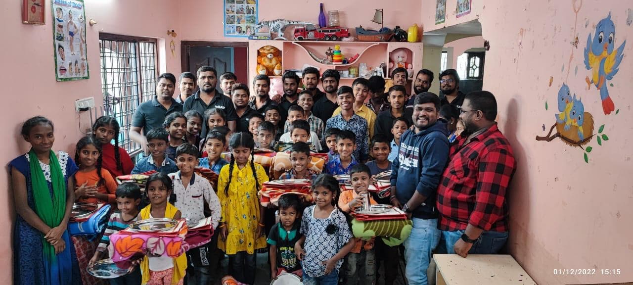 Children receiving essentials at Amma Jyothi